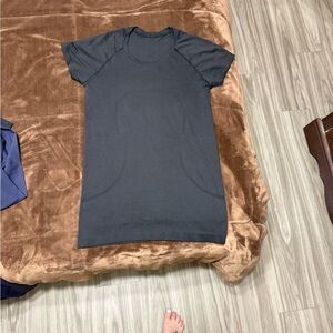 Woman’s size 8 Lululemon Black Swiftly Tech Tee